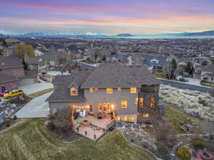 Birds eye view of property with a residential view and a mountain view