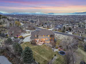 Birds eye view of property featuring a mountain view and a residential view