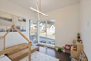 Dining area with a residential view and wood finished floors