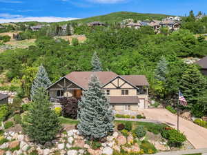 View of subject property with mountains