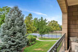 Balcony with a tennis court