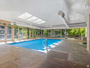 Community pool featuring a patio area