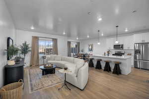 Living room featuring recessed lighting and wood finished floors