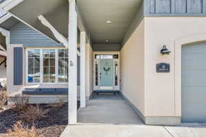 Property entrance with stucco siding