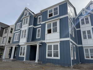 View of property with board and batten siding