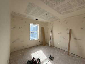 Unfurnished room with visible vents
