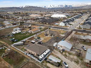 Drone / aerial view featuring a residential view and a mountain view