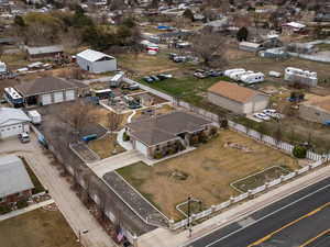 Birds eye view of property featuring a mountain view and a residential view
