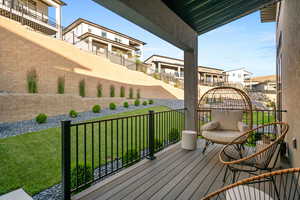 Deck featuring a lawn