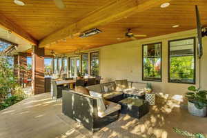 View of patio / terrace featuring a ceiling fan, outdoor dining area, and outdoor lounge area