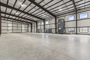 Garage with heating unit and metal wall