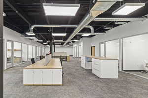 Below grade area featuring carpet flooring