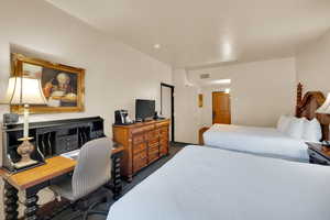 Carpeted bedroom with visible vents