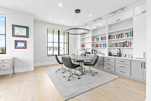 Office area with recessed lighting, built in features, and lots of natural light