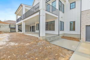 Covered back patio off basement family room