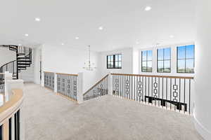 Open space and spiral staircase with access to play area