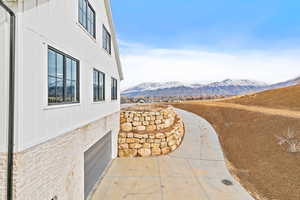 Views of driveway accessing basement garage space