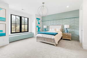 Bedroom featuring visible vents, recessed lighting, carpet flooring, and an accent wall