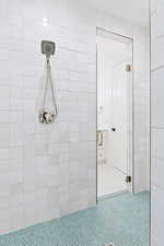 Full bathroom featuring a stall shower