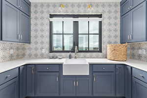Laundry room with farmhouse sink