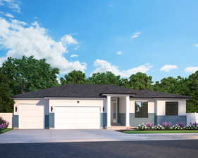 View of front of property with driveway, a garage, and fence