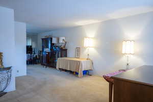View of carpeted bedroom