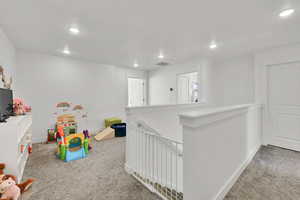 Playroom featuring recessed lighting, carpet, baseboards, and visible vents