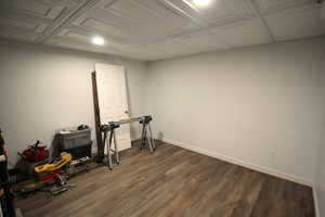 Misc room featuring recessed lighting, dark wood finished floors, and baseboards