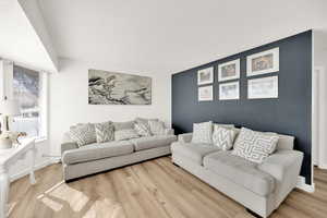 Living area with wood finished floors