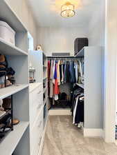 Primary bedroom closet 1