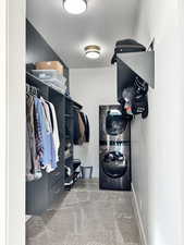 Primary bedroom closet 2 with laundry area