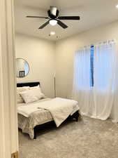Bedroom with recessed lighting, ceiling fan, and carpet