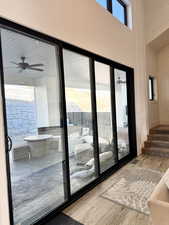 Retractable sliding door to private covered back patio for indoor/outdoor living in summer