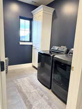Laundry area with cabinet space