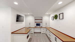 Unfurnished office with recessed lighting and light carpet