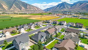 Aerial view featuring a residential view and a mountain view