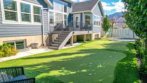 Exterior space featuring fence and a mountain view