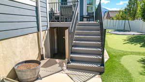 Details with stucco siding and fence