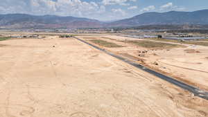 Overview of rural landscape featuring mountains and a desert landscape