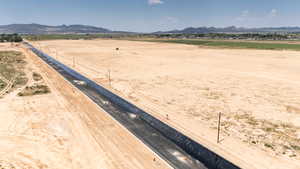 Overview of rural landscape with a mountainous background