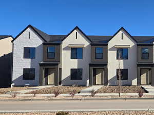 View of front of house featuring stone siding