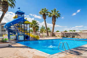 Pool with waterslide is accessable through the clubhouse.