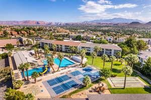 Birds eye view of property featuring a mountain view