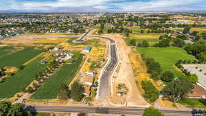Drone / aerial view with a mountain view and a rural view