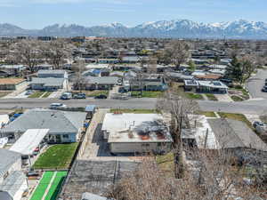Drone / aerial view featuring a mountain view and a residential view