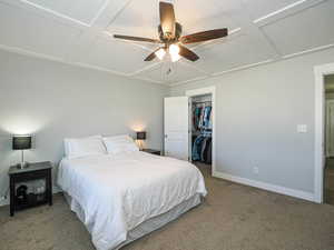 Bedroom with carpet flooring, attic access, coffered ceiling, and baseboards