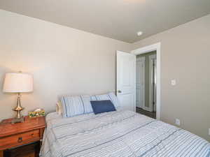 Bedroom featuring a textured ceiling