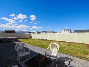 View of yard with a patio and a fenced backyard