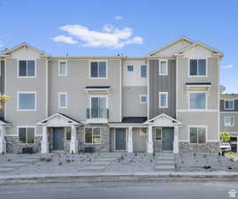 Multi unit property featuring stone siding and central AC