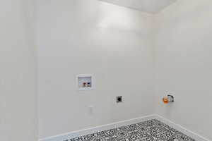 Laundry room with electric dryer hookup